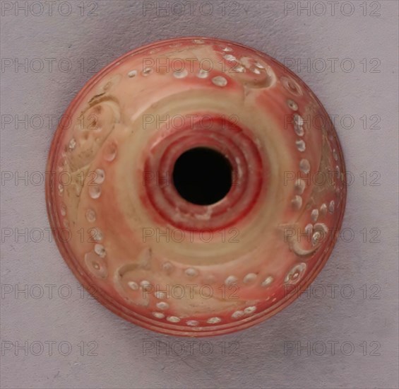 Spindle Whorl, Iran, 9th-10th century. Excavated at Nishapur, providing evidence the city possessed a thriving textile industry