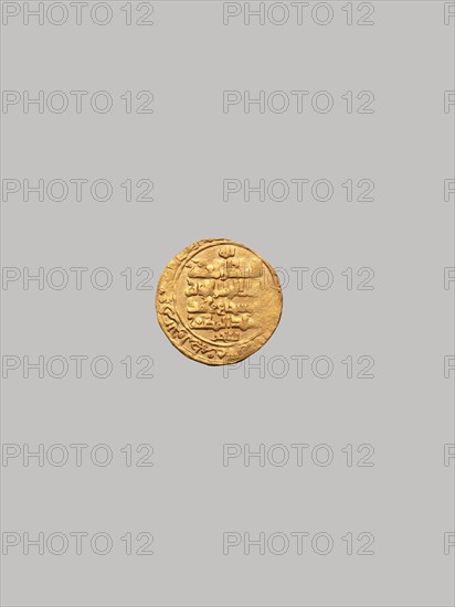 Coin, Iran, dated A.H. 493/ A.D. 1099. Gold dirham with inscription naming Sanjar and his brother, with verses 33:9 and 9:61 of the Qur?an.