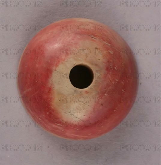 Spindle Whorl, Iran, 9th-10th century.  Excavated at Nishapur, providing evidence the city possessed a thriving textile industry.