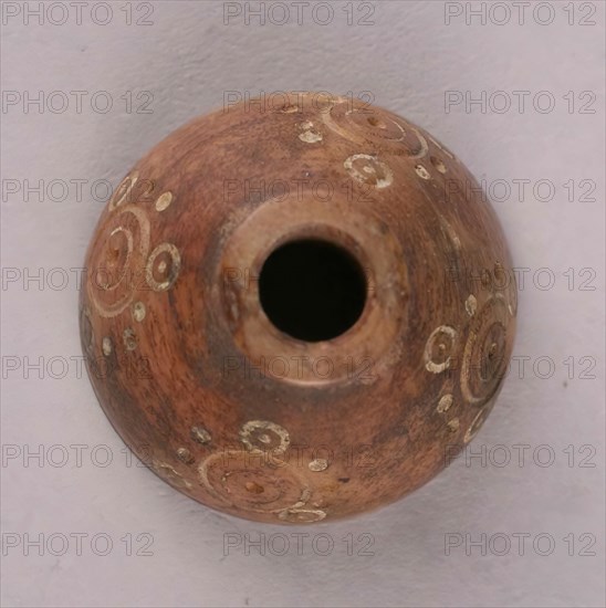 Spindle Whorl, Iran, 9th-10th century. Excavated at Nishapur, providing evidence the city possessed a thriving textile industry