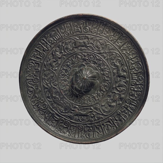 Mirror, Iran, 12th century. With inscription bearing good wishes in Arabic.