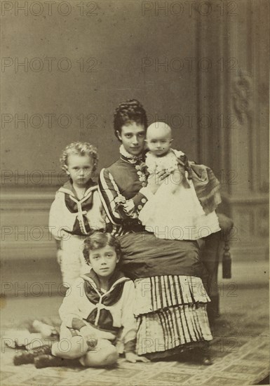 Grand Duchess Maria Fyodorovna with children, Nicholas Alexandrovich, George Alexandrovich and Xenia Alexandrovna, c. 1875. Private Collection.