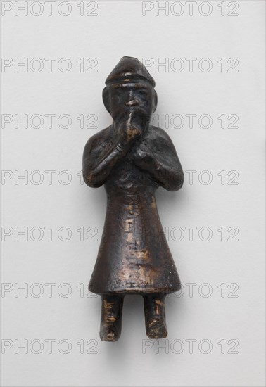 Figure, probably 11th-12th century.