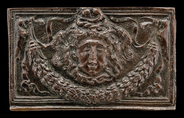End panel of a writing casket: Medusa Head, Garland, and Bucrania, c. 1500.