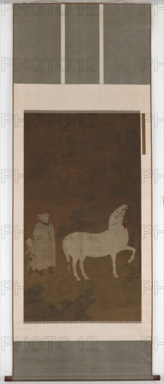 Central Asian groom pasturing a horse, 14th century.