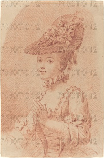 A Young Girl Wearing a Flowered Hat.