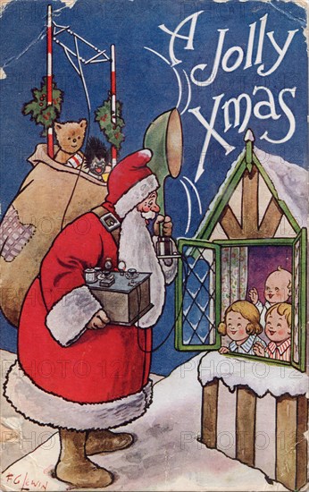 A Jolly Xmas, 1934. Father Christmas holds a transmitter with loudspeaker and aerial.