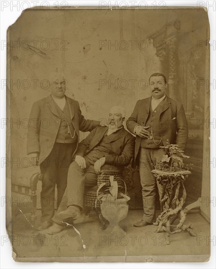 Albumen print of three members of the Boyd family, 1890-1930. Creator: Unknown.