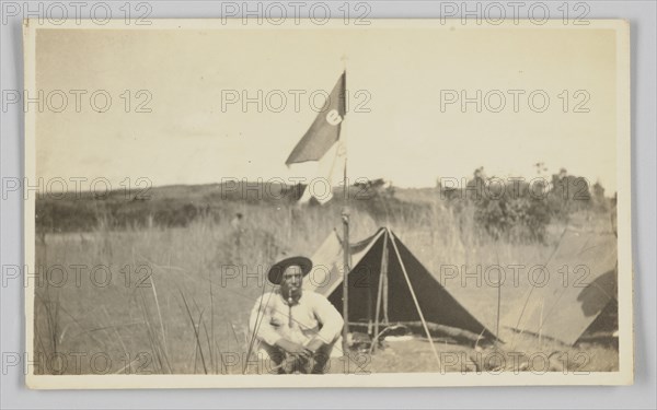 Photographic postcard of Charles Wilbur Rogan in the Philippines, 1910-1919. Creator: Unknown.