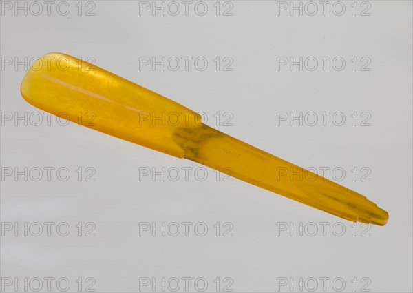 Bakelite shoe horn from dresser set owned by Lena Horne, mid 20th Century. Creator: Agalin.