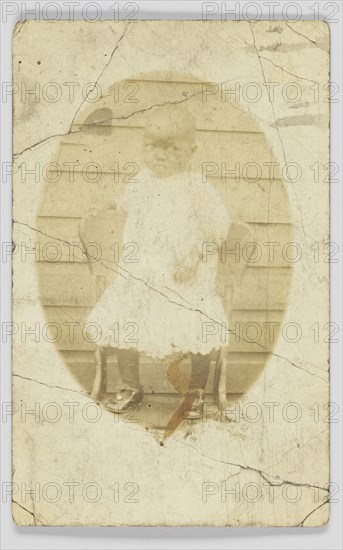 Photographic postcard of unidentified child, 1904-1918. Creator: Unknown.