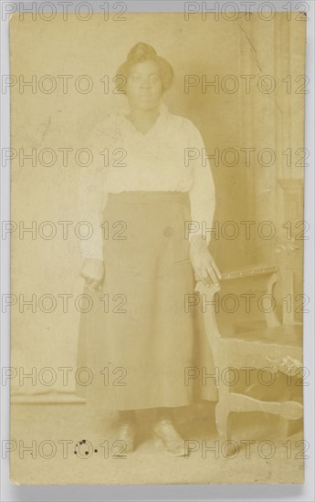 Photographic postcard of a woman, 1918-1930. Creator: Unknown.