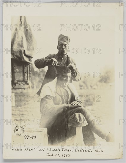 A close shave - 317th Supply Train, Belleville, Meuse, Oct. 12, 1918, October 12, 1918. Creator: Unknown.