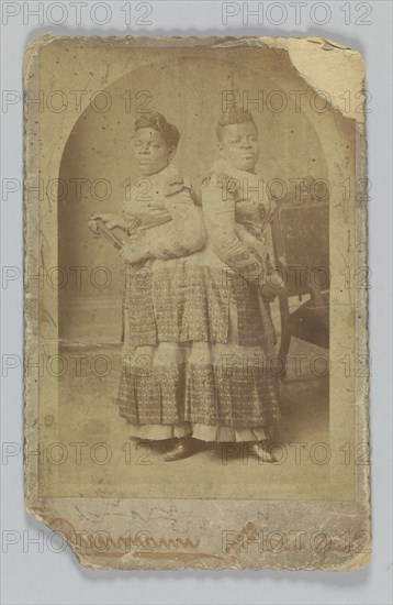 Albumen print of Millie and Christine McCoy, 1880s -1890s. Creator: Charles Eisenmann.
