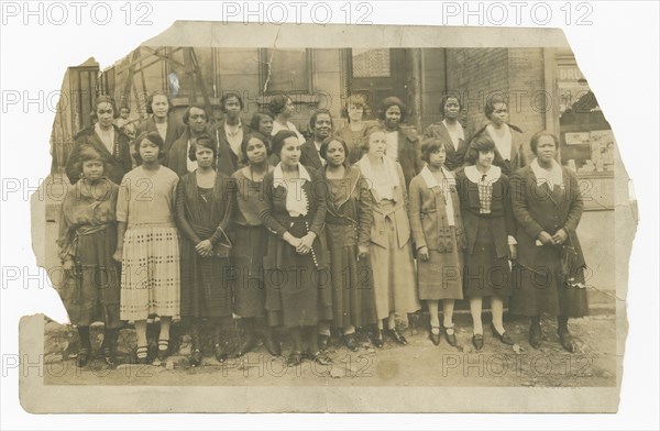 Photograph of Lucille Brown among Poro agents and one small child, 1915-1953. Creator: Unknown.