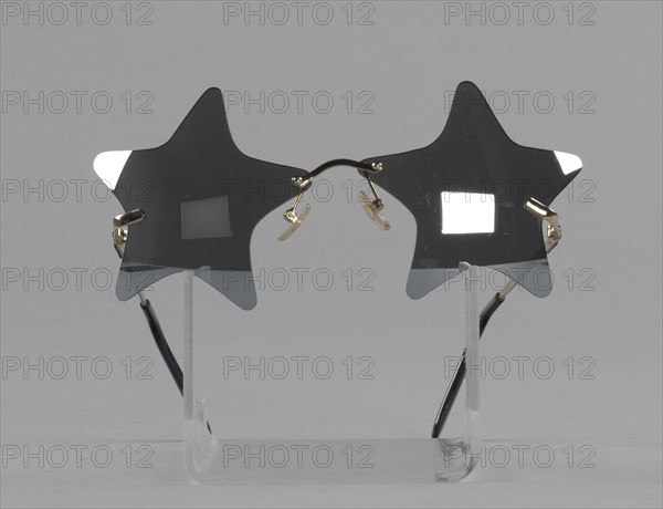 Bootsy Collins style star-shaped mirrored lens sunglasses, 1993-2013. Creator: elope, inc..