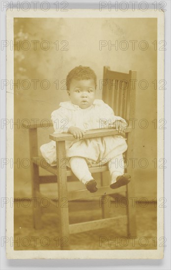 Photographic postcard of unidentified child, 1917-1930. Creator: Unknown.