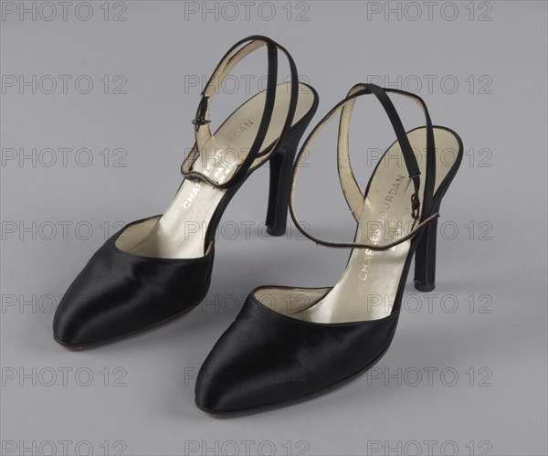 Pair of black stiletto heel shoes by Charles Jourdan from Mae's Millinery Shop, 1941-1994. Creator: Charles Jourdan.