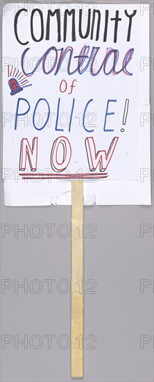 Placard reading "community control of police now" used at Baltimore protests, April 2015. Creator: Unknown.