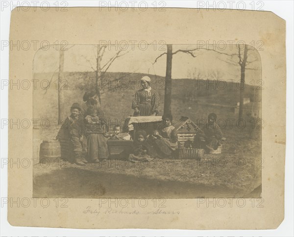 Albumen print of enslaved women and their children near Alexandria..., Dec 2, 1861 to Mar 10, 1862. Creator: James E. Larkin.