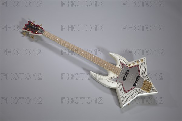 Bootsy Collins Space Bass guitar owned by Bootsy Collins, July 2002. Creator: Washburn Guitars.