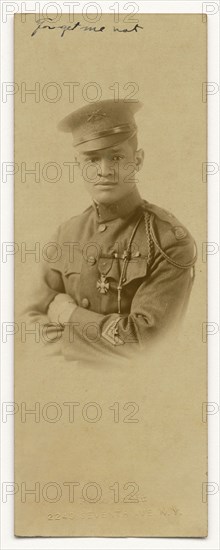 Photograph of Cpl. Lawrence McVey in uniform wearing the Croix de Guerre medal, ca. 1920. Creator: Alva Studio.