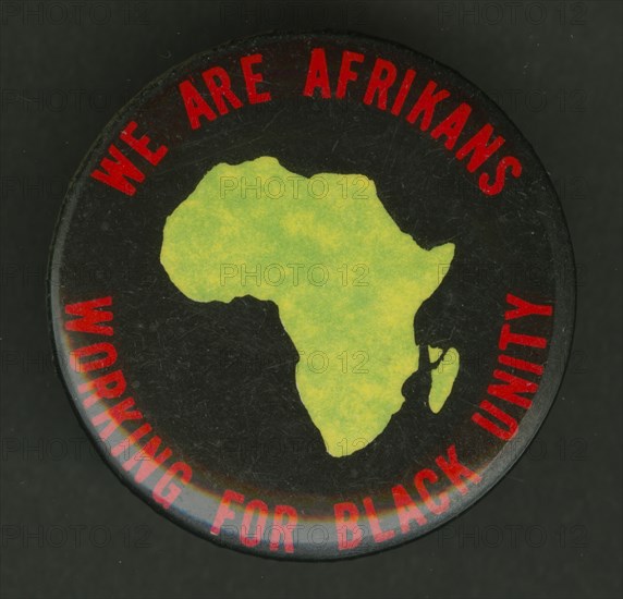 Pinback button promoting black unity, mid 20th century. Creator: Unknown.