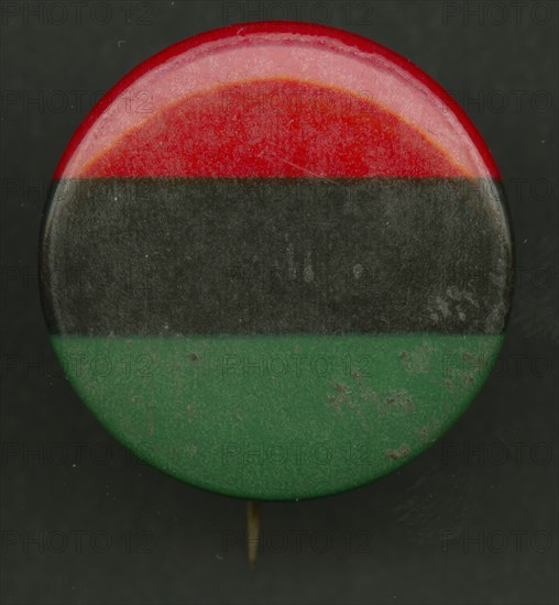 Pinback button of the Pan-African flag, after 1955. Creator: AFL-CIO.