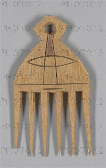 Wood hair comb from Ghana, 1950s. Creator: Unknown.