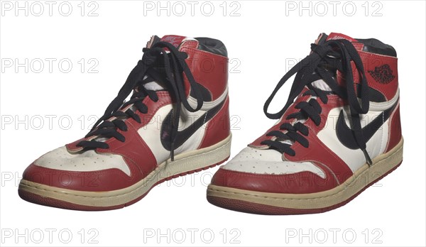 Pair of Air Jordan I shoes game-worn and autographed by Michael Jordan, 1984-1985. Creator: Nike.