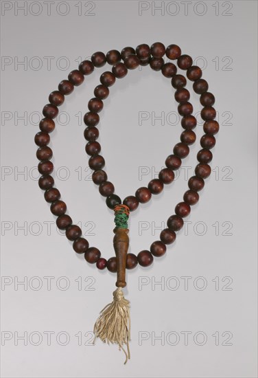 Wooden prayer beads owned by Suliaman El-Hadi, late 20th century. Creator: Unknown.