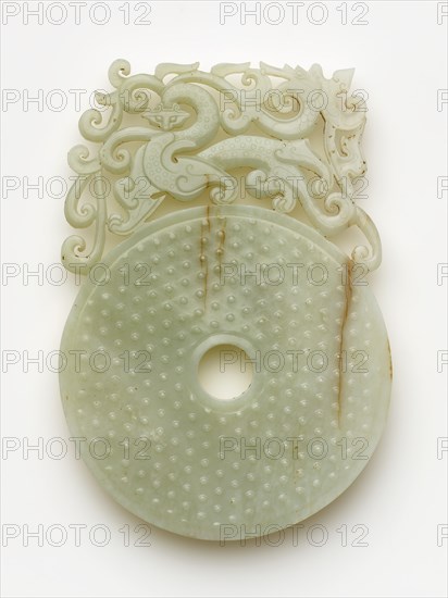Disk (bi) with knobs, feline and dragon, Eastern Han dynasty, 100-220. Creator: Unknown.
