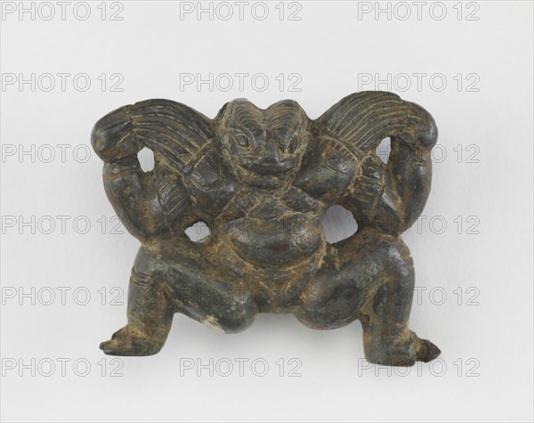 A crouching figure, Eastern Zhou to Western Han dynasty, 3rd century BCE. Creator: Unknown.