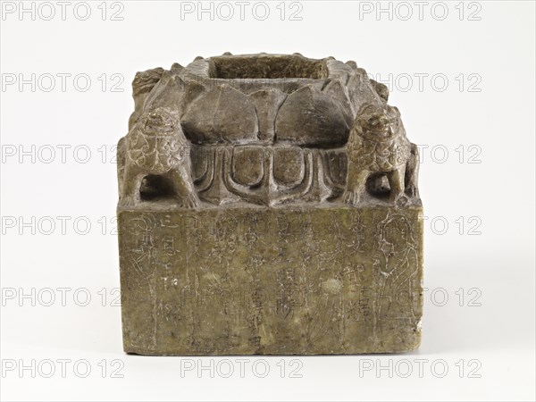 Pedestal with lotus petals, lions, and donor, originally supporting...,Period of Division, dated 573 Creator: Unknown.