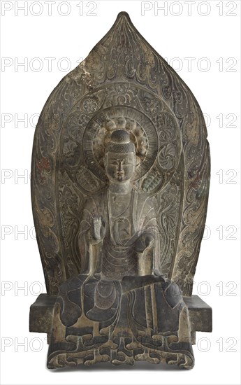 Seated figure of the Buddha Sakyamuni in high relief, Period of Division, 534-550. Creator: Unknown.