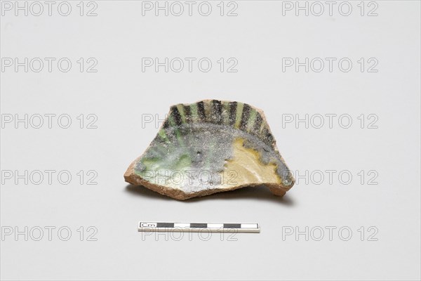 sherd, red body, white slip, yellow, green, black glaze, Mamluk period, 1250-1516. Creator: Unknown.