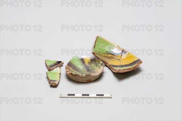 sherd, red body, white slip, yellow, green, black glaze, Mamluk period, 1250-1516. Creator: Unknown.