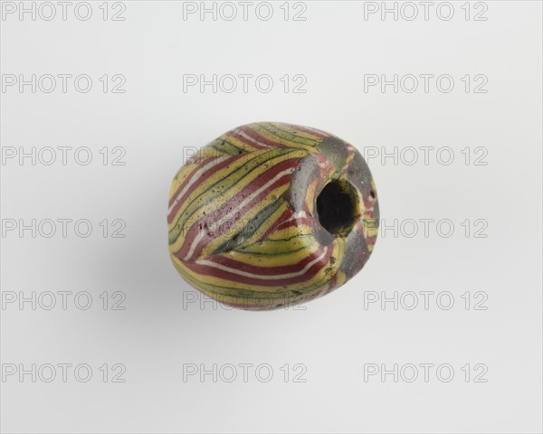 Bead. One end chipped, Roman Period, 1st-2nd century. Creator: Unknown.