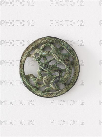 Costume ornament: dragon in roundel (pair with F1917.565), Goryeo period, 12th-13th century. Creator: Unknown.