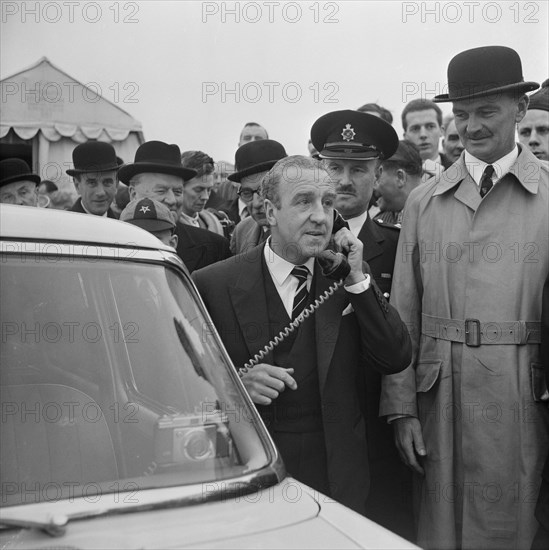 The Minister of Transport, Ernest Marples, using a police car's radio telephone..., M1, 02/11/1959. Creator: John Laing plc.