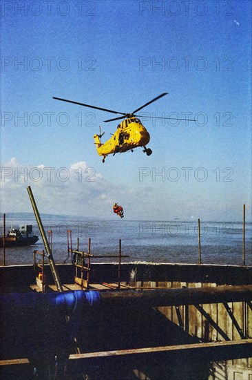 RAF Rescue helicopter hovering over the Second Severn Construction site..., Apr 1992 - 1995. Creator: John Laing plc.