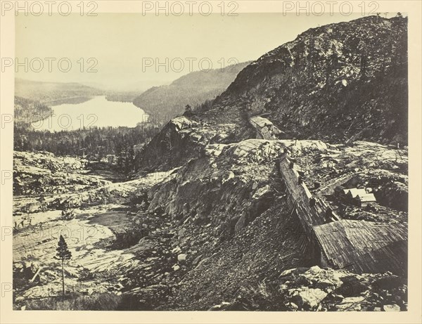 Summit of Sierra Nevada, Snow Sheds in Foreground, Donner Lake in the Distance, C. P. R. R., 1868/69 Creator: Andrew Joseph Russell.