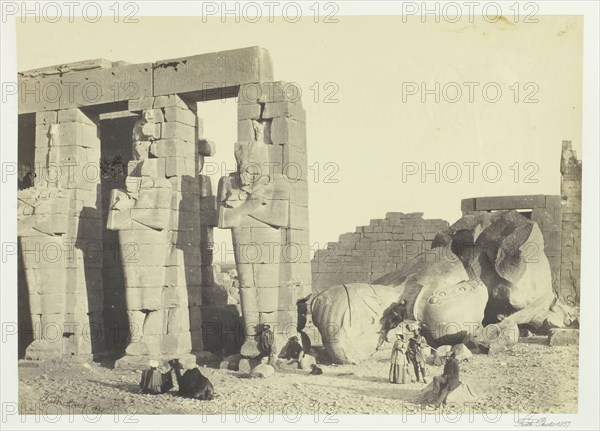 Osiride Pillars and Great Fallen Colossus, at the Memnonium, Thebes, 1857. Creator: Francis Frith.