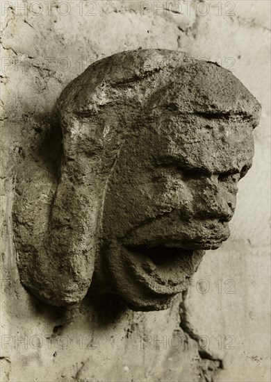 Ely Cathedral: Head in South Nave Triforium, c. 1891. Creator: Frederick Henry Evans.