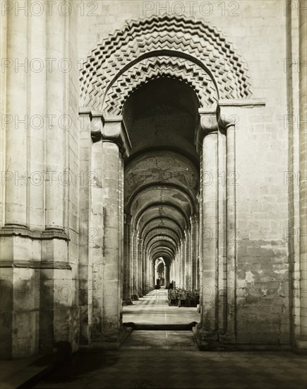 Ely Cathedral: South Aisle to East, from Southwest Transept, 1891. Creator: Frederick Henry Evans.