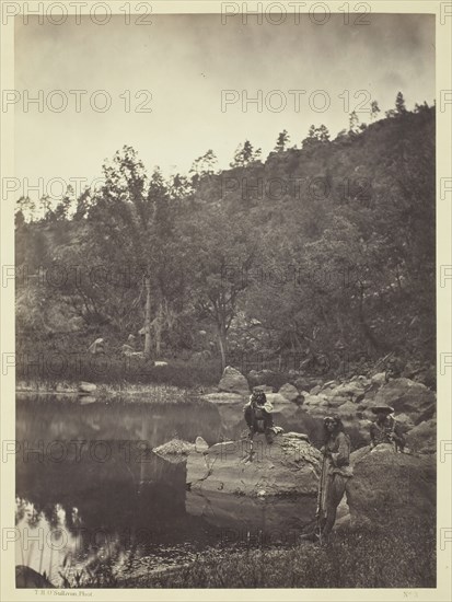 View on Apache Lake, Sierra Blanca Range, Arizona, Two Apache Scouts in the Foreground, 1873. Creator: Tim O'Sullivan.