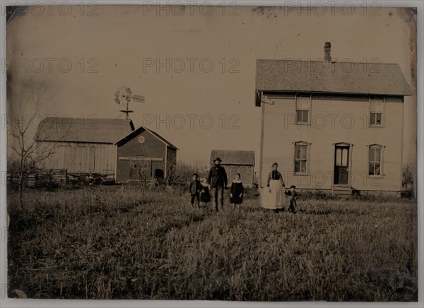 Untitled (A Man, a Woman, and Three Children Standing in Front of a Farmhouse), 1875. Creator: Unknown.