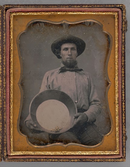 Untitled (Portrait of a Man Wearing a Hat, Holding a Mining Pan), 1854. Creator: Unknown.