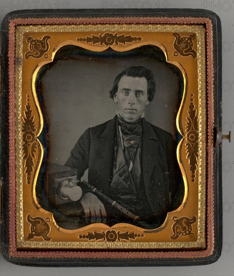 Untitled (Portrait of a Seated Man with a Camera), 1853. Creator: Unknown.