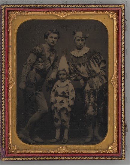 Untitled (Portrait of two Men and one Boy, Dressed in Clown Costumes), 1865. Creator: Unknown.